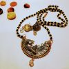 Gold plated peacock design pendant long mangalsutra with earring - Image 3